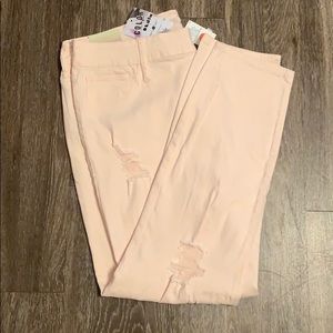New with tags size 22 light pink/peach ripped jean